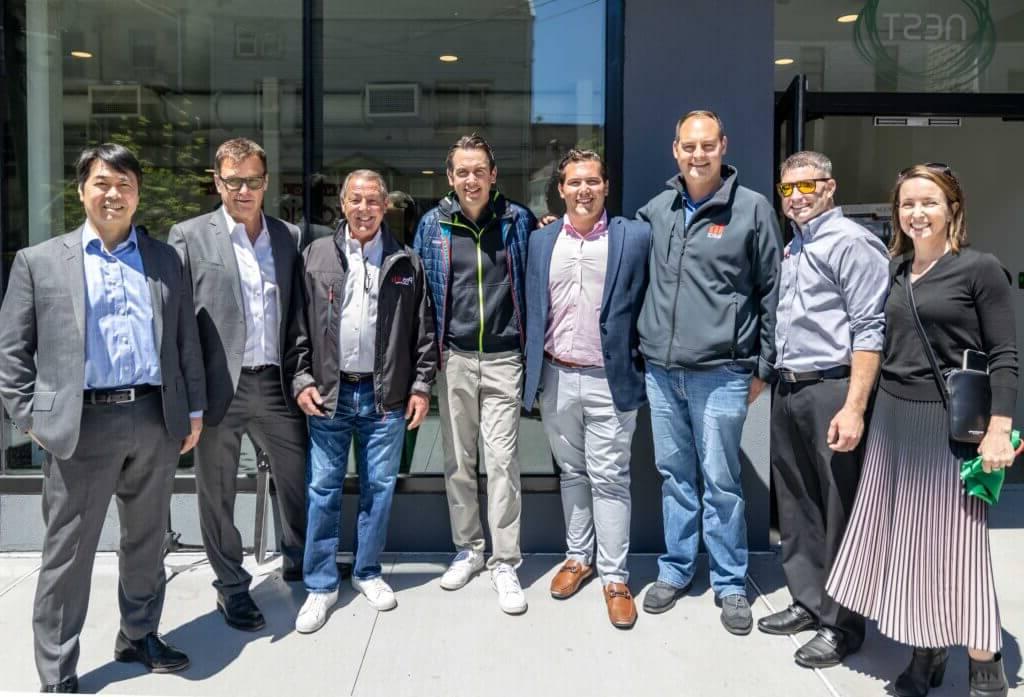 Nest Grand Opening Ceremony (Left to Right) Nicole Robertson of GRO Architects, Alan Wolener of 365体育平台, Todd Laubach of 365体育平台, Derek Weissman of Procida Funding, 泽西城的富洛普市长, Billy Procida of Procida Funding, Keith Schwebel of KSNY Development, and Ken Sato of Strategic Properties